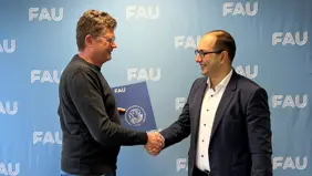 Professor Marc Stamminger (left) with Dr-Ing. Anatoli Djanatliev (Photo: FAU Tech).